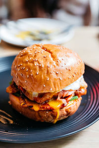 Close-up of burger in plate on table