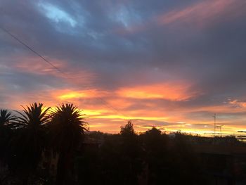 Scenic view of cloudy sky at sunset