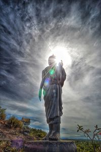 Low angle view of statue against sky