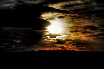 Scenic view of dramatic sky during sunset