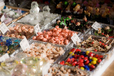 Various small good luck charm figures at a store, a new year tradition