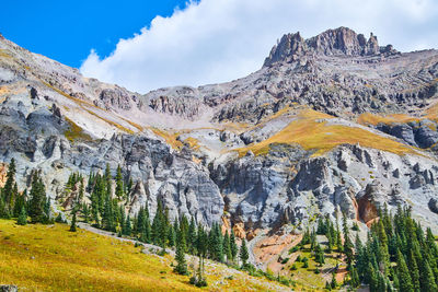 Scenic view of rocky mountains against sky