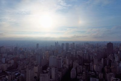 High angle view of buildings in city against sky