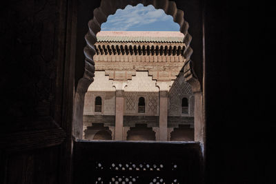 Historic building seen through window