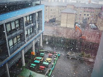 High angle view of wet road in city during rainy season