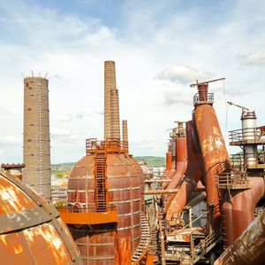 Panoramic view of factory against sky