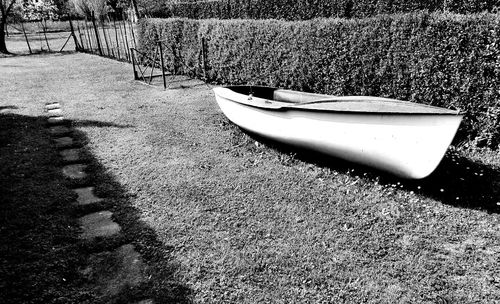 High angle view of boats moored on field