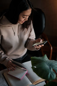 Young woman using mobile phone