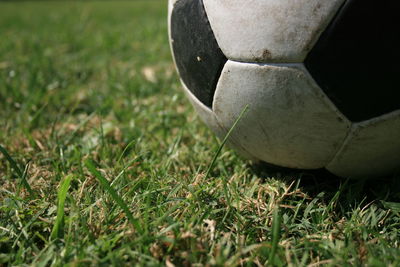 Close-up of soccer ball on field