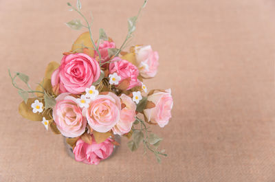 Close-up of pink rose bouquet on table