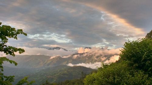 Scenic view of mountains against sky during sunset