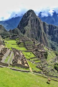 Aerial view of machu picchu against cloudy sky