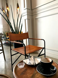 Coffee cup on table at home