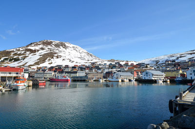 Scenic view of boats moored in harbor