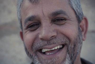 Close-up portrait of smiling man