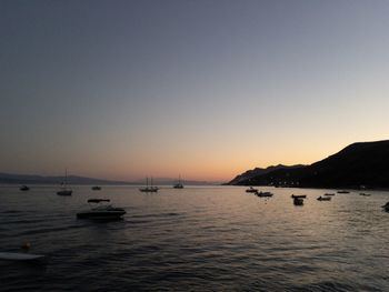 Scenic view of sea against clear sky during sunset