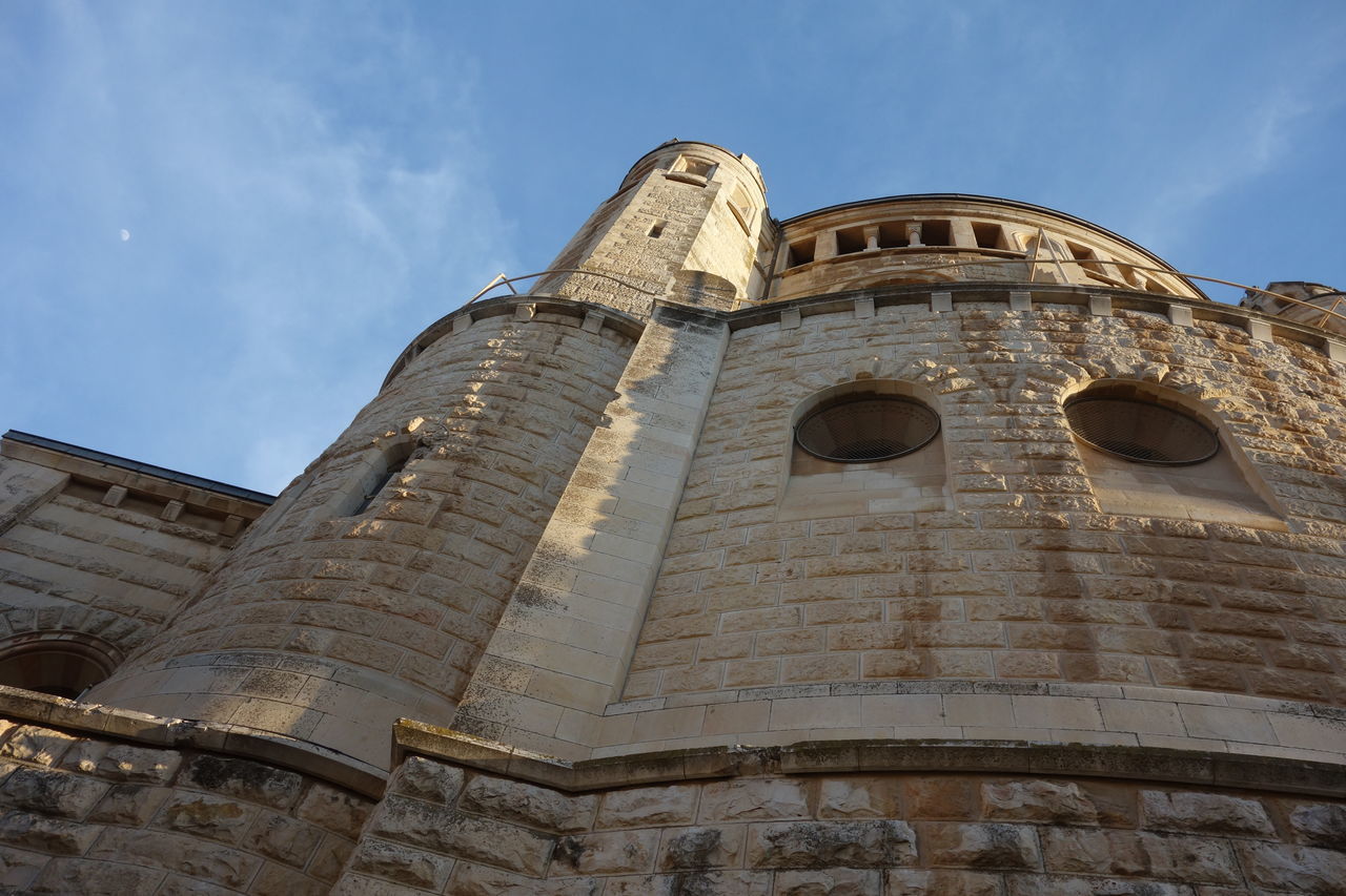 low angle view, history, architecture, built structure, building exterior, spirituality, day, religion, place of worship, sky, ancient, no people, travel destinations, outdoors, ancient civilization