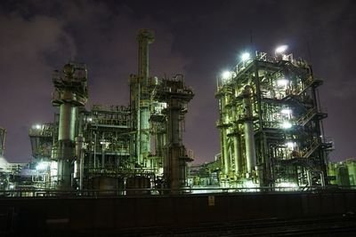 Illuminated factory at night