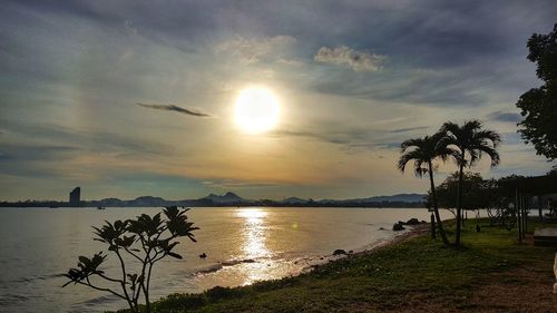 Scenic view of sea against sky at sunset