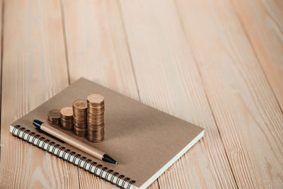 High angle view of coins on table