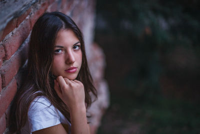 Portrait of beautiful young woman with long hair