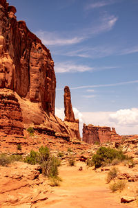 Rock formations on landscape against sky