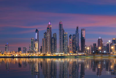 Amazing dubai marina and famous jumeirah beach at sunset, united arab emirates