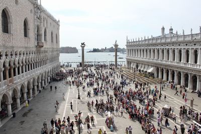 Group of people in front of historical building
