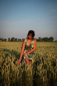 Woman standing in field