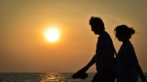 Scenic view of sea at sunset