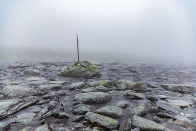 Scenic view of rocks against sky