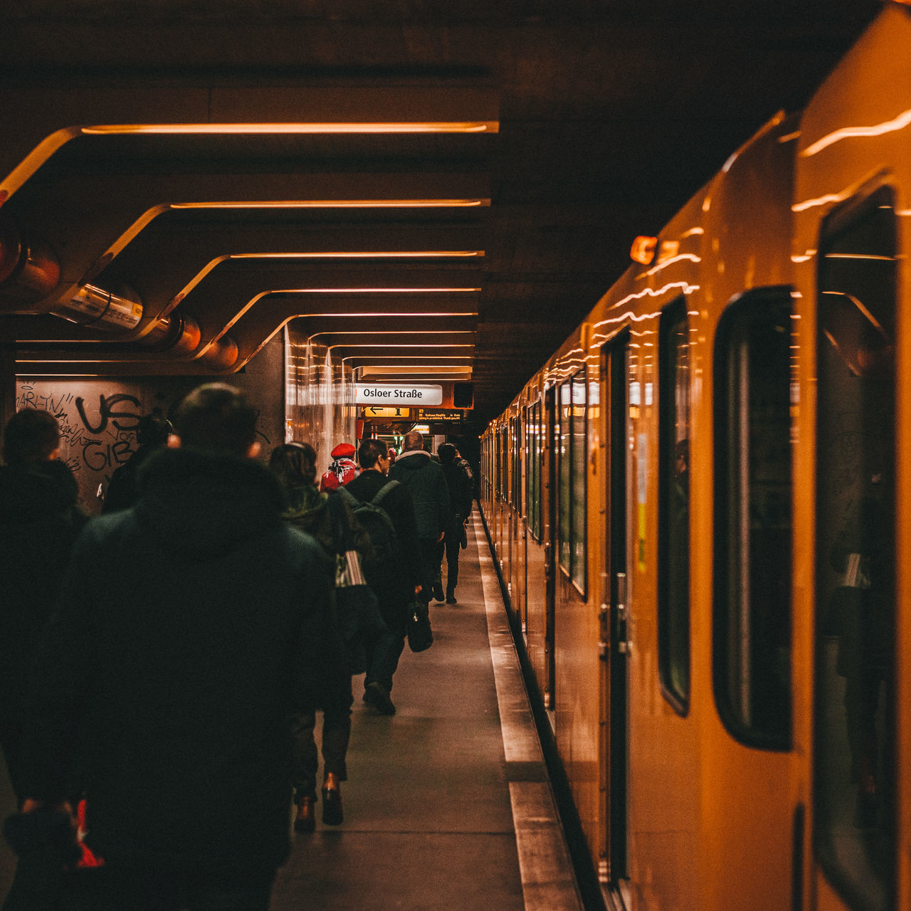 REAR VIEW OF PEOPLE ON TRAIN