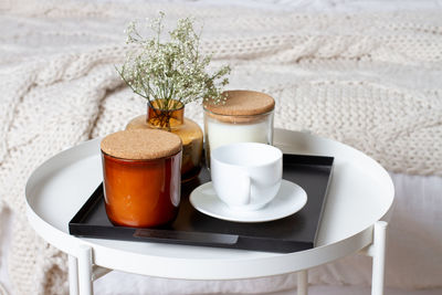 Coffee and cup on table