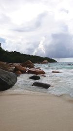 Scenic view of beach against sky