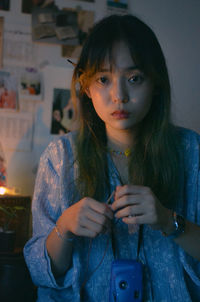 Portrait of beautiful young woman wearing mask