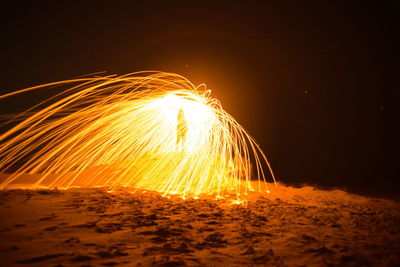 Firework display at night