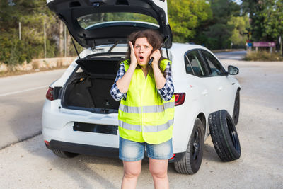 Side view of woman in car