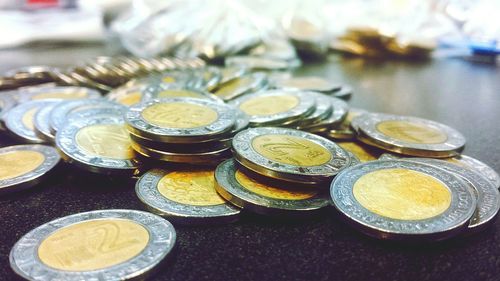 Close-up of mexican pesos on table