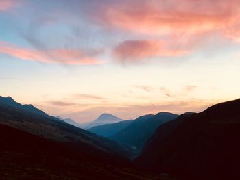 Scenic view of mountains against sky during sunset