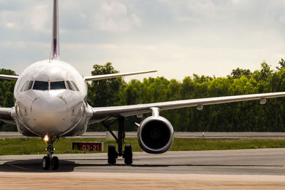 Airplane on airport runway