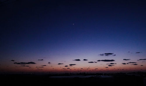 Scenic view of sea against sky at sunset