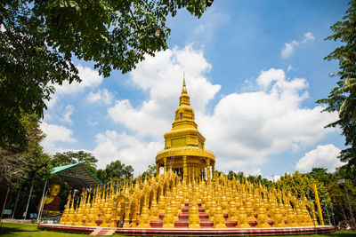 Low angle view of temple against building