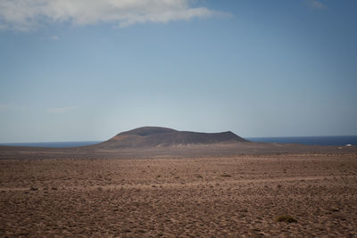 Scenic view of desert against sky