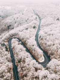 High angle view of winding road on landscape