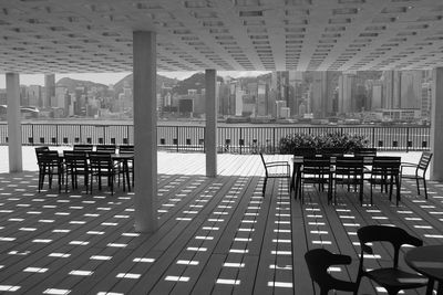 Empty chairs and tables in restaurant