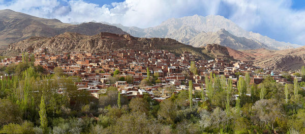 Panoramic shot of townscape against mountain range