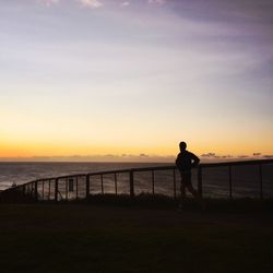 Silhouette of people at sunset