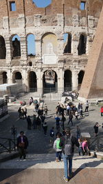 Group of people in front of historical building