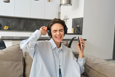 Young woman using mobile phone