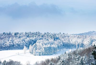 Scenic view of snow covered mountains